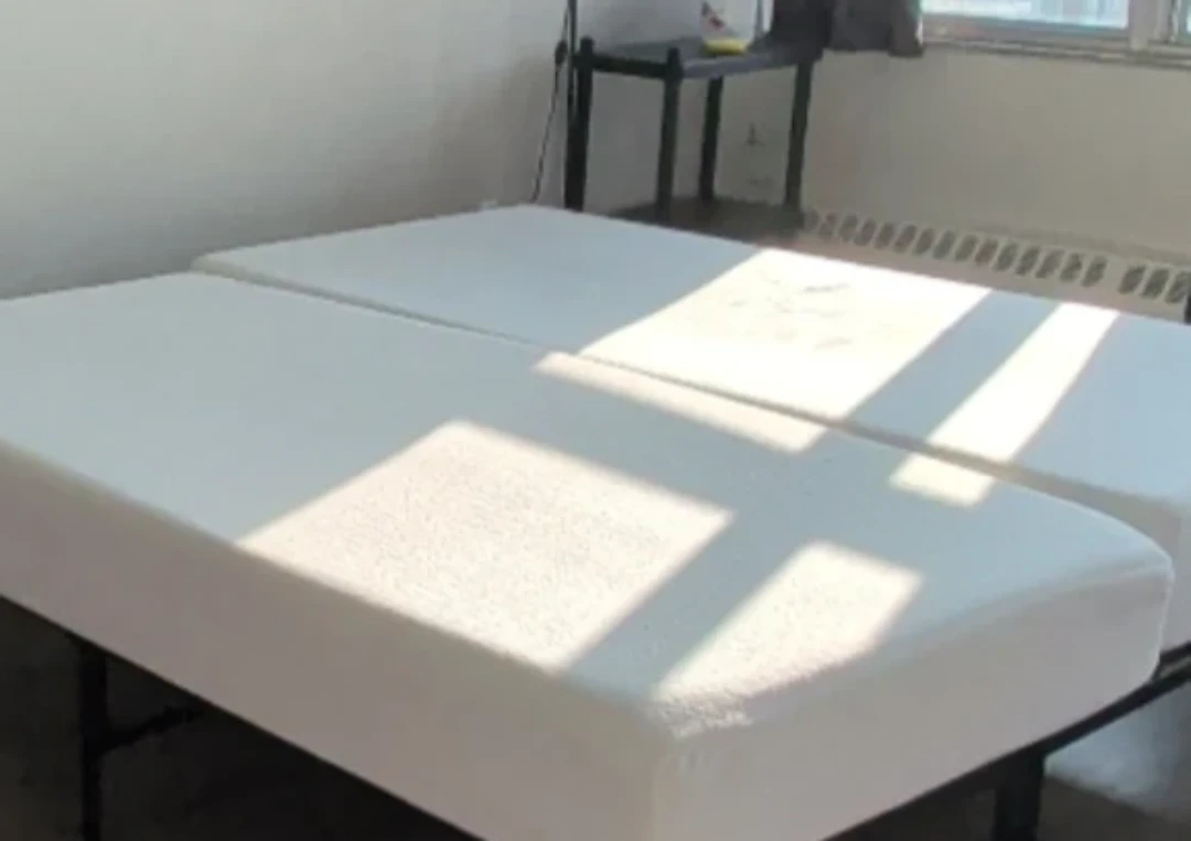 Two white foam mattresses and two twin foldable beds. - photo 3