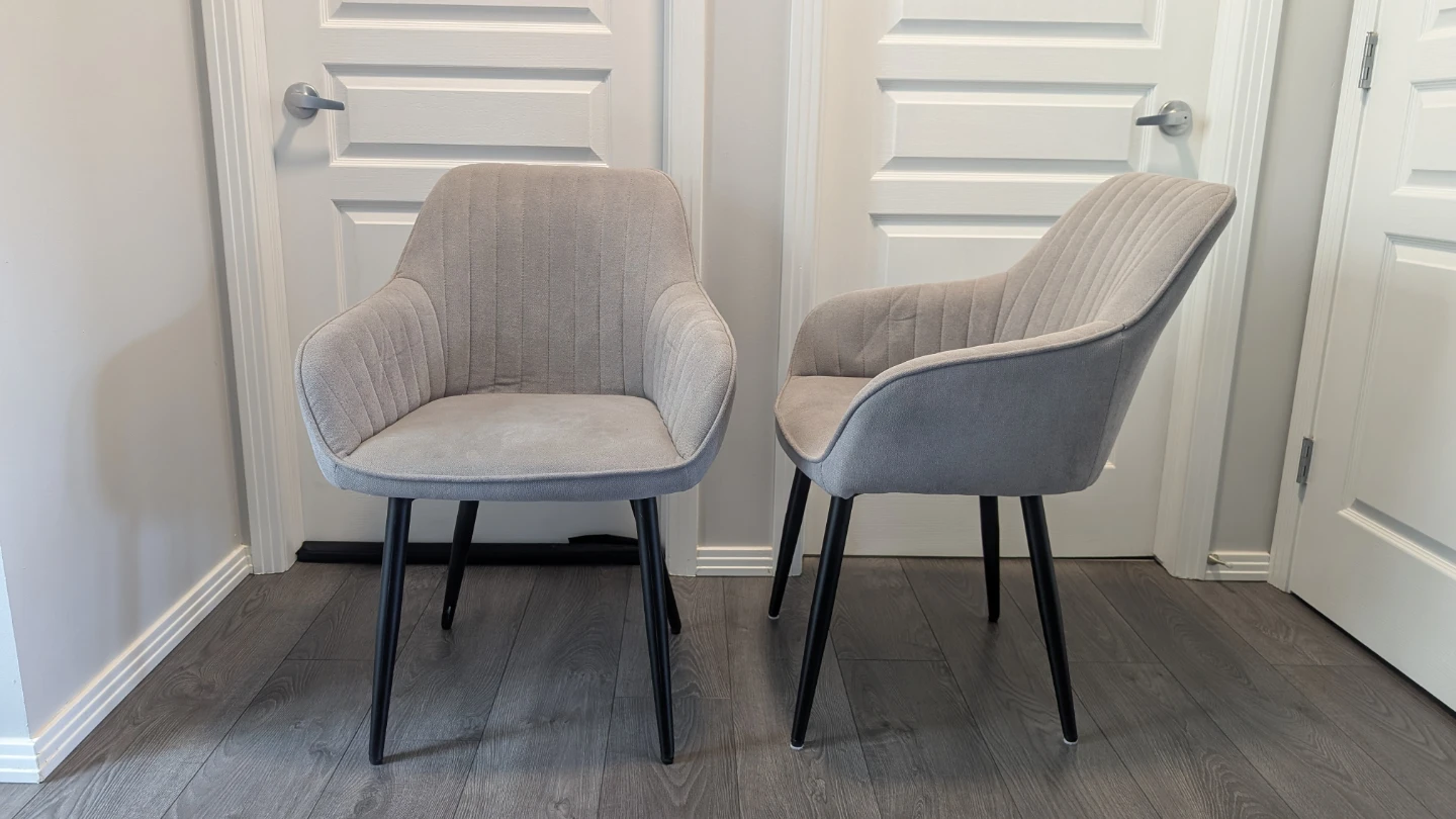 Pair of grey upholstered table height chairs