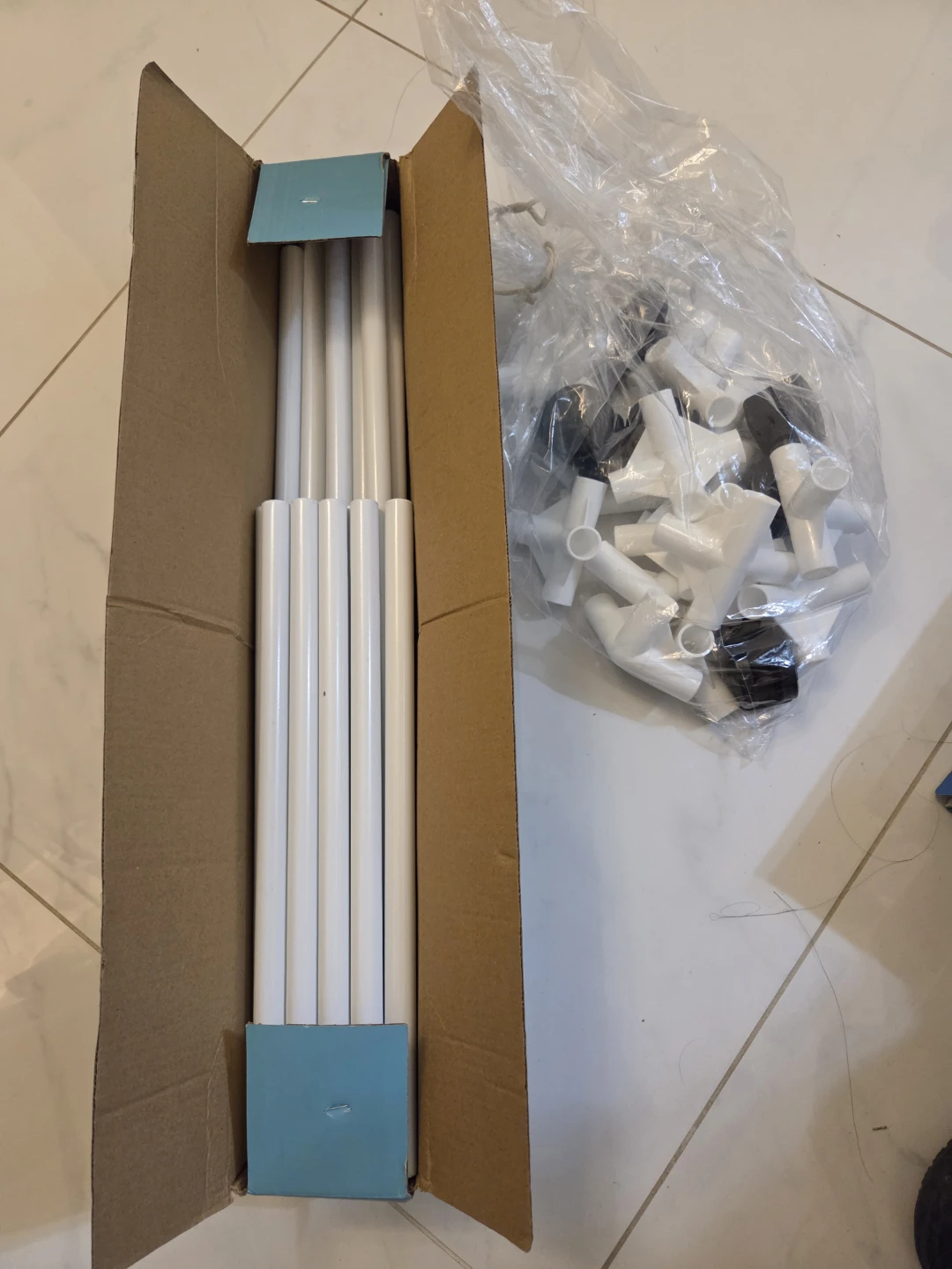 White hexagonal clothes drying rack with rotating wheels - photo 3