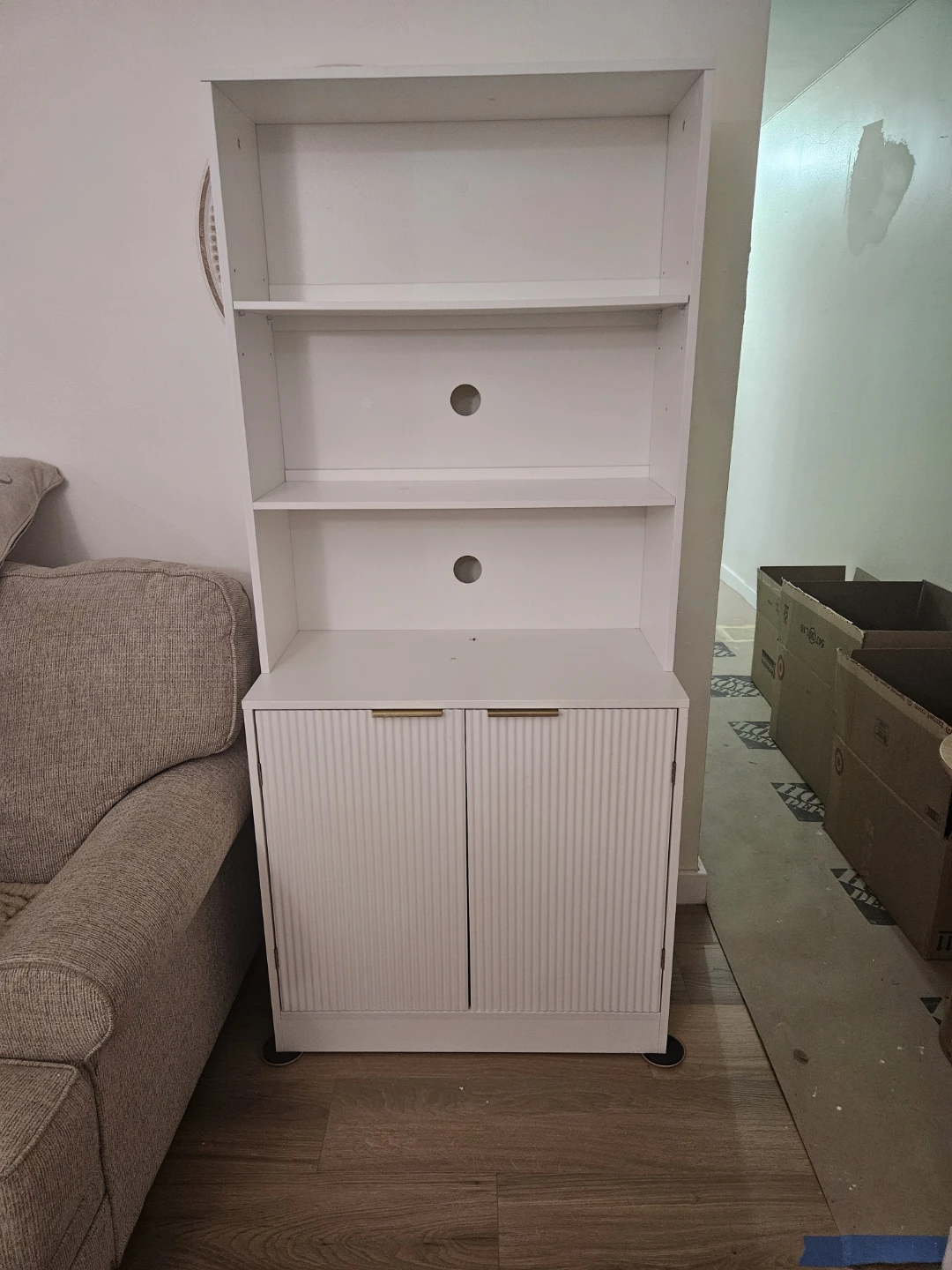 White Storage Cabinet with Shelves and Doors