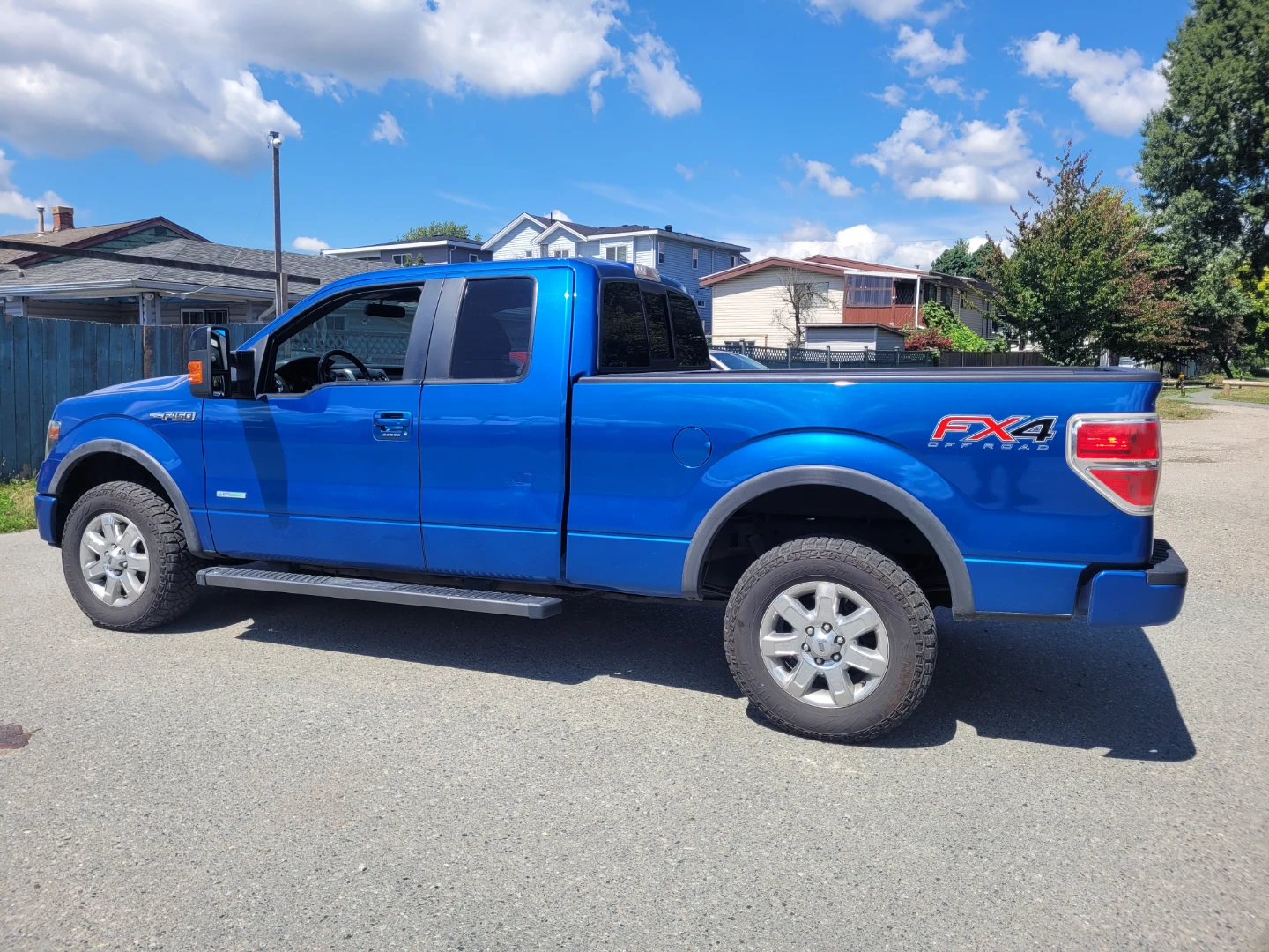 Blue Ford F-150 FX4 Off-Road Pickup Truck - photo 3