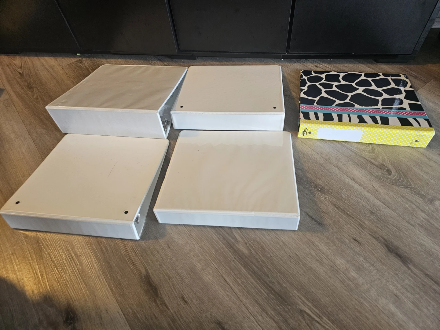 4 White Binders and 1 Decorative Binder