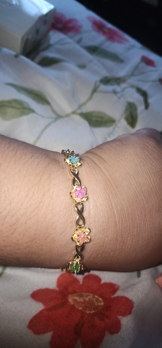 Gold plated bracelet with colorful floral charms - photo 5