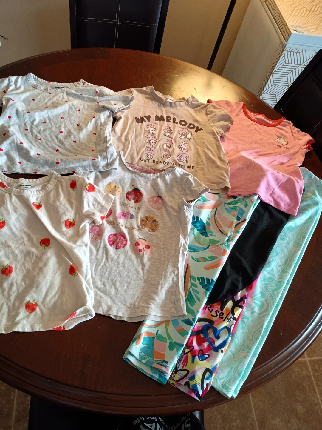 Kids size 6, leggings and short sleeve tops