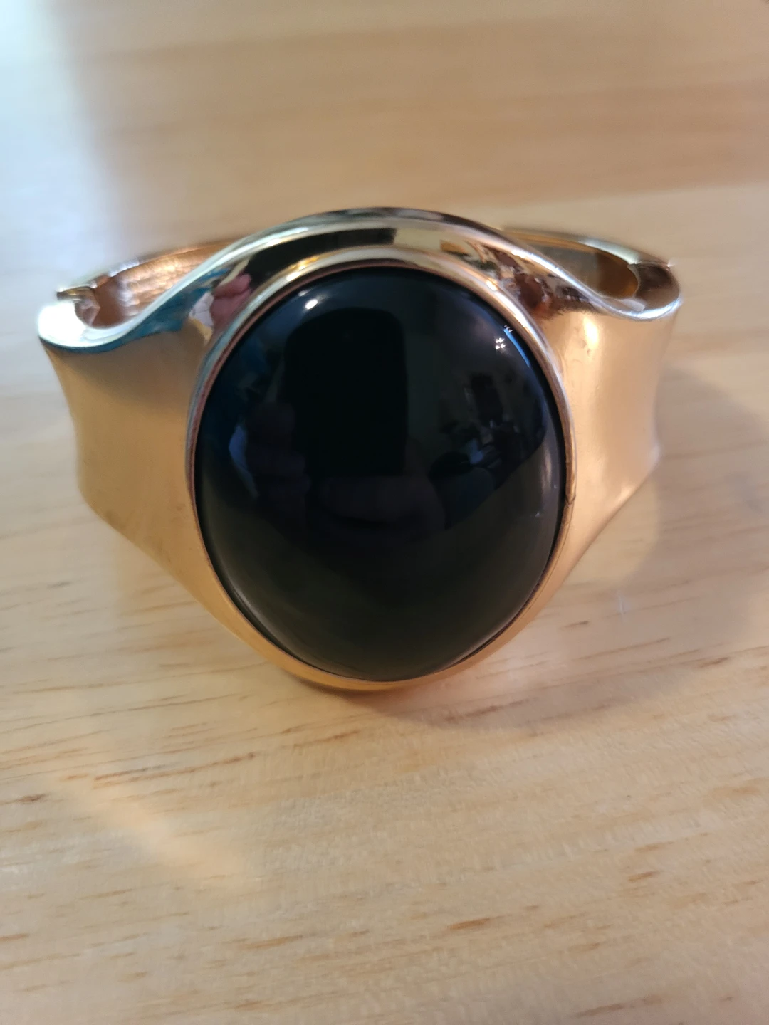 Gold tone cuff bracelet with black stone accent - photo 3