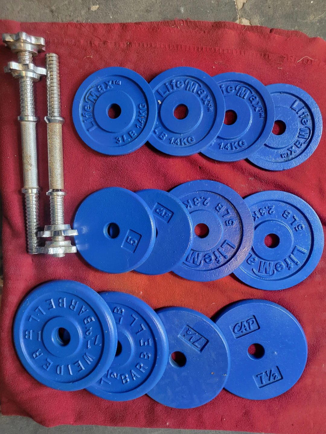 ADJUSTABLE  DUMBBELLS 1" HOLE  62LBs.