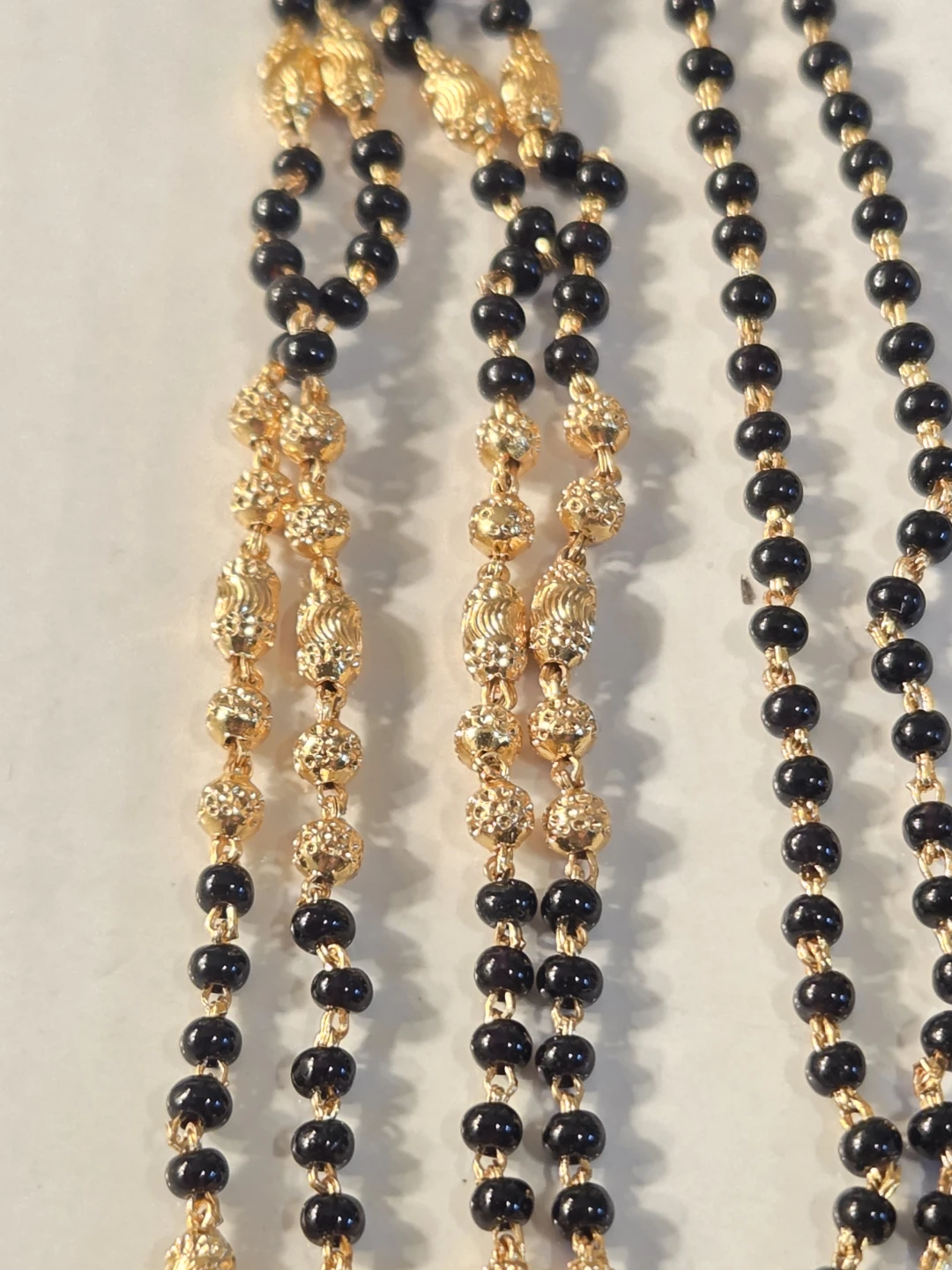 Gold Necklace with Black Beads and Ruby Accents - photo 3