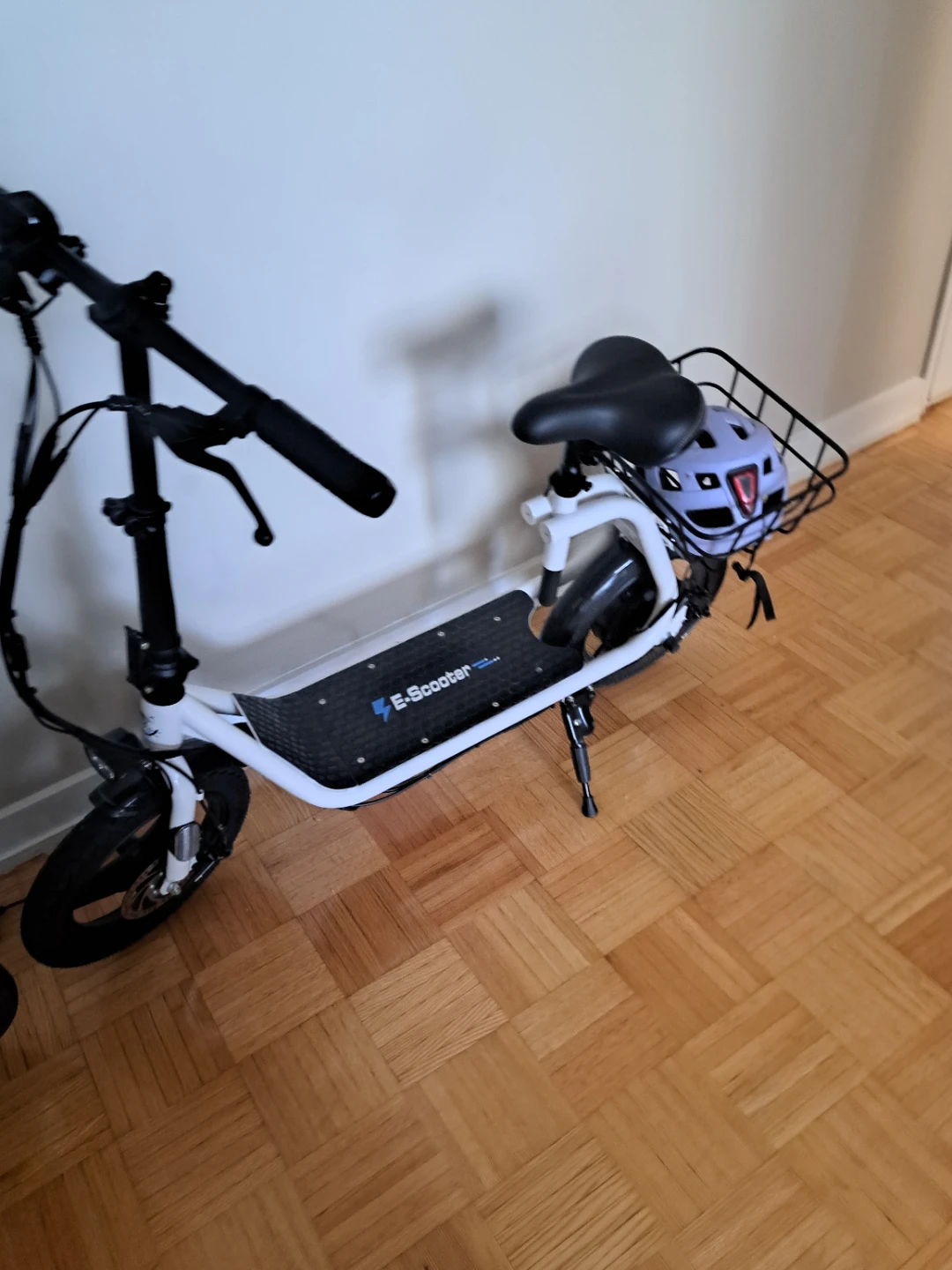 White E-Scooter with Seat and Basket