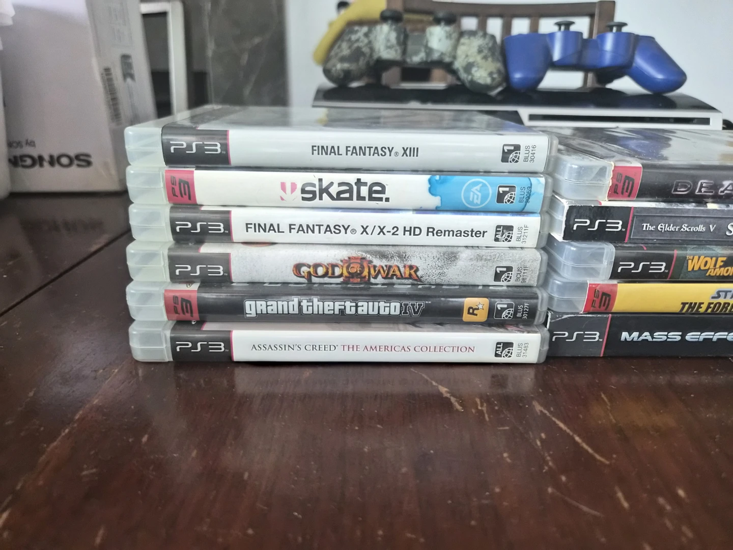 Sony PlayStation 3 Console with Games and Controllers - photo 2