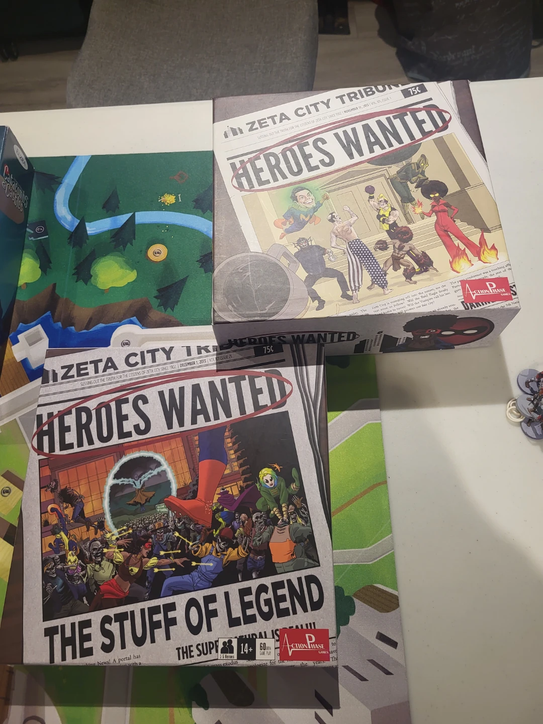 Zeta City Tribune Heroes Wanted Board Game and expansion