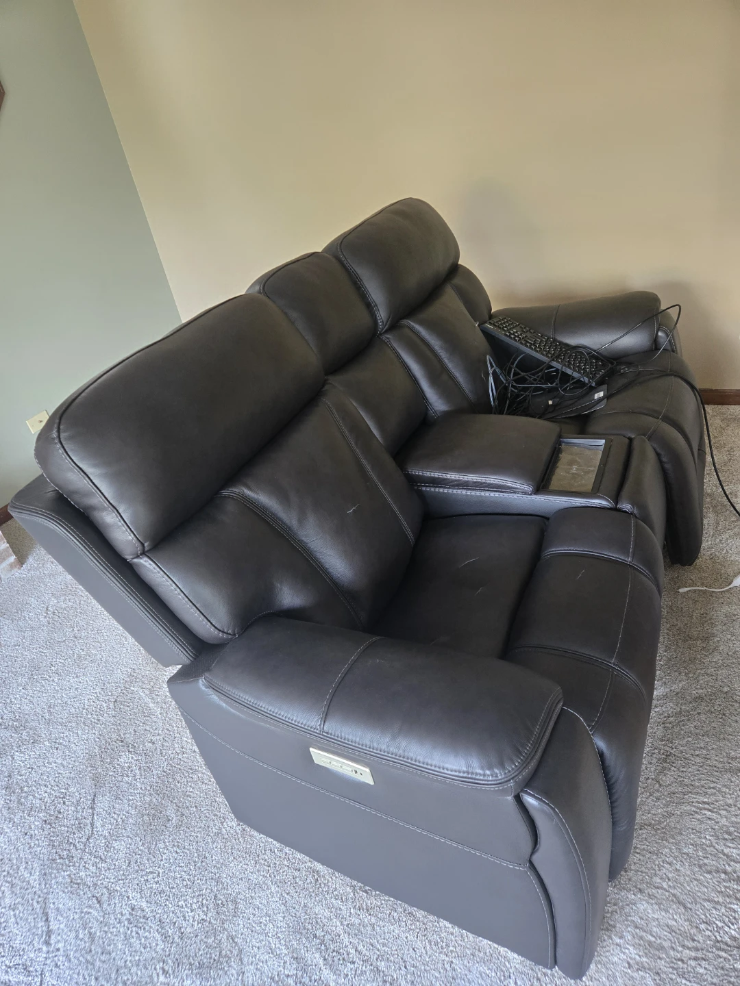 Black faux leather Loveseat.  Some tears, no powercord. - photo 2