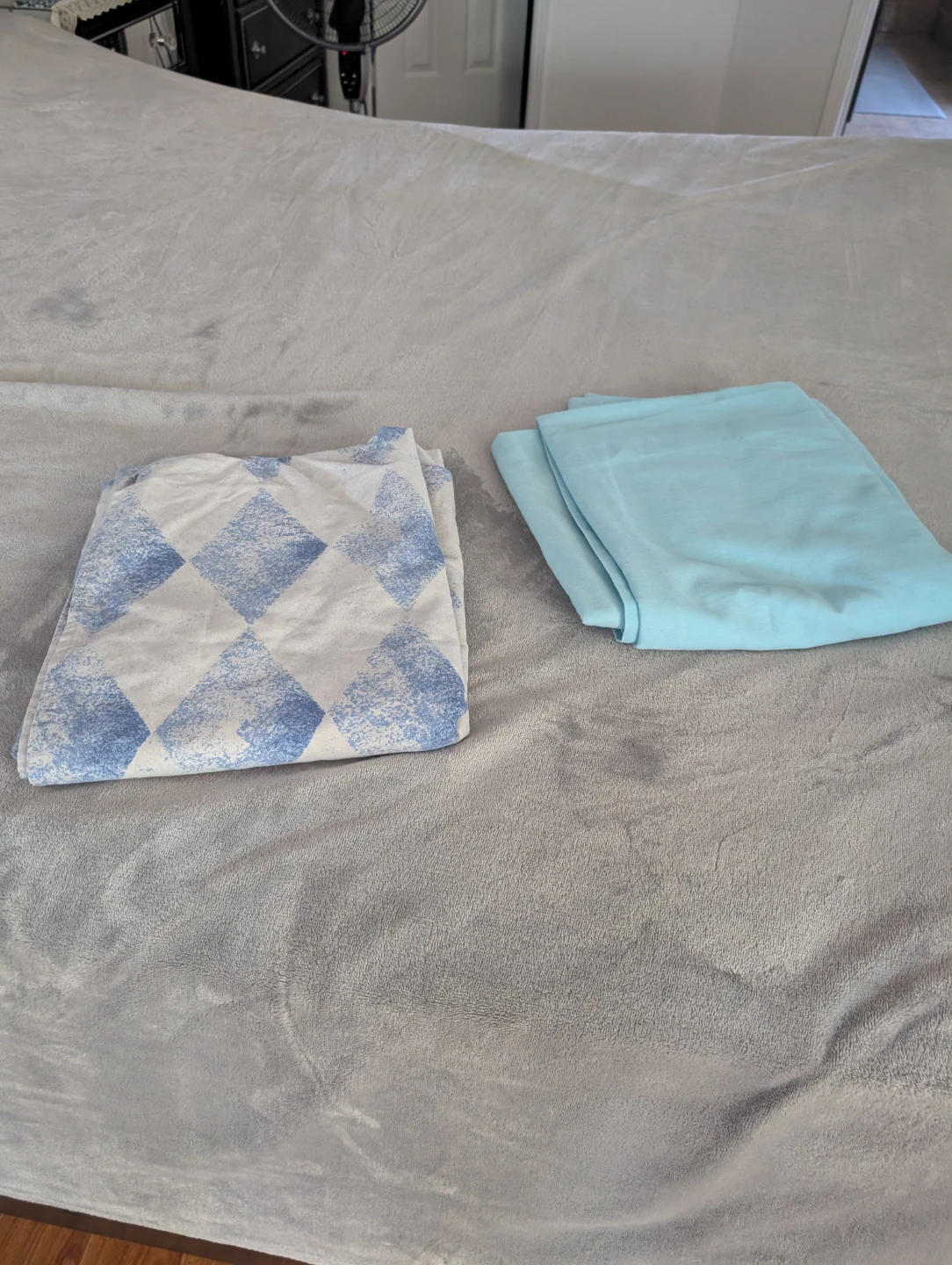 Folded Bed Sheets - Blue Diamond Pattern & Solid Blue$4 each