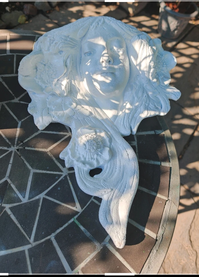 Elegant Nouveau-style female face planter