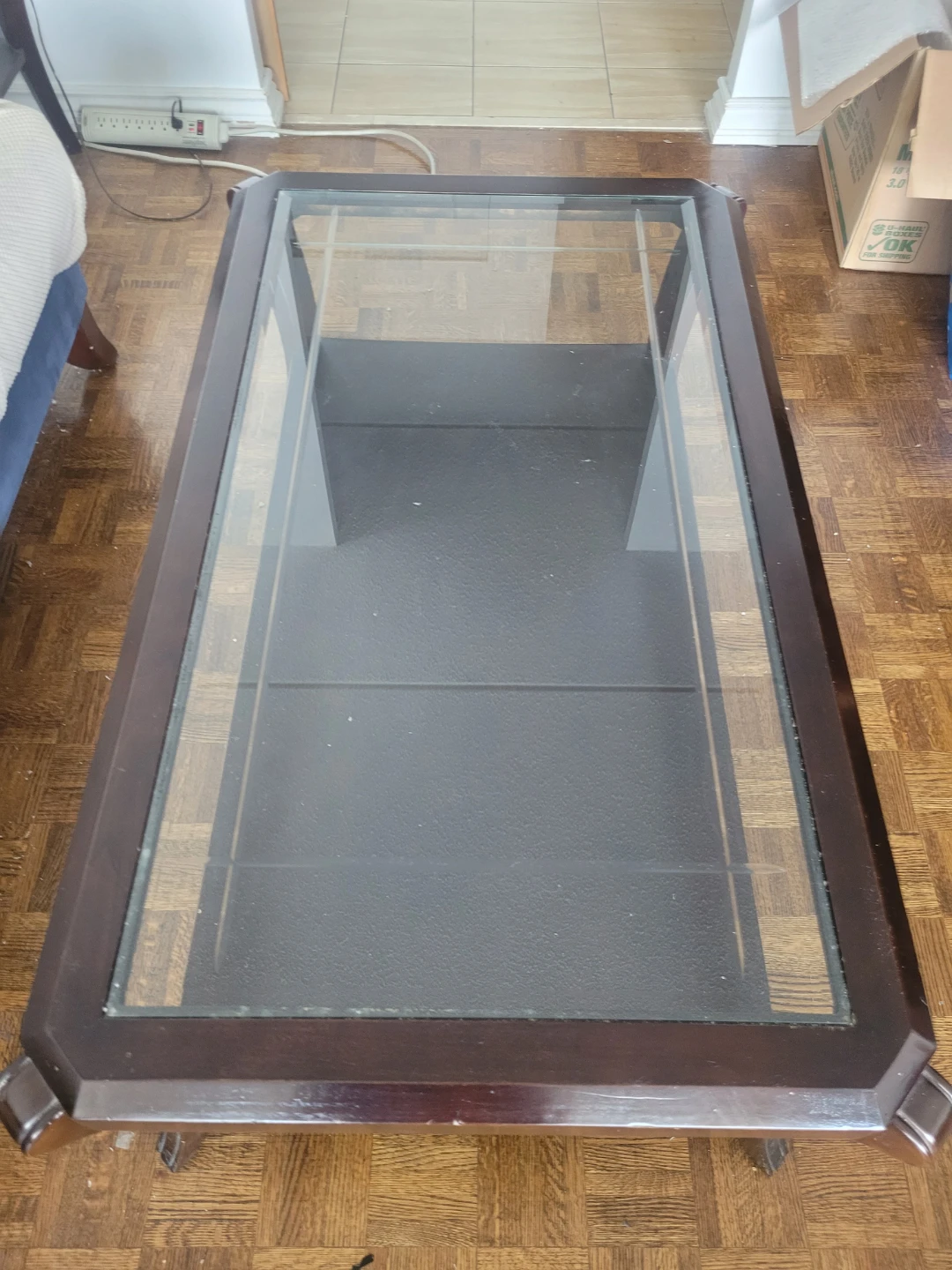 Elegant Glass-Top Coffee Table with 2 side tables.