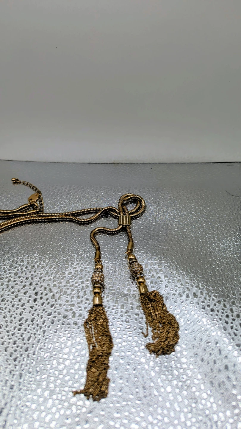 Gold-tone necklace with tassel ends - photo 4