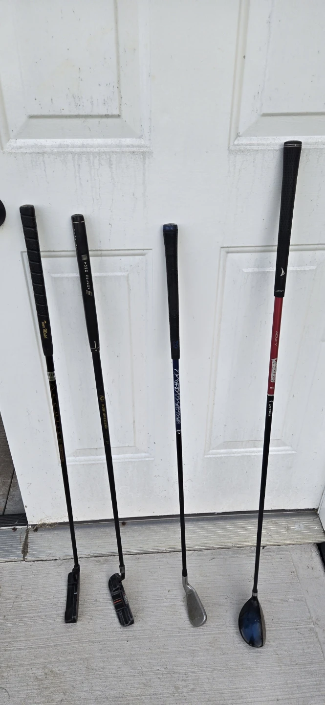 Mixed Golf Clubs: 2 Putters, 1 Iron, 1 Hybrid
