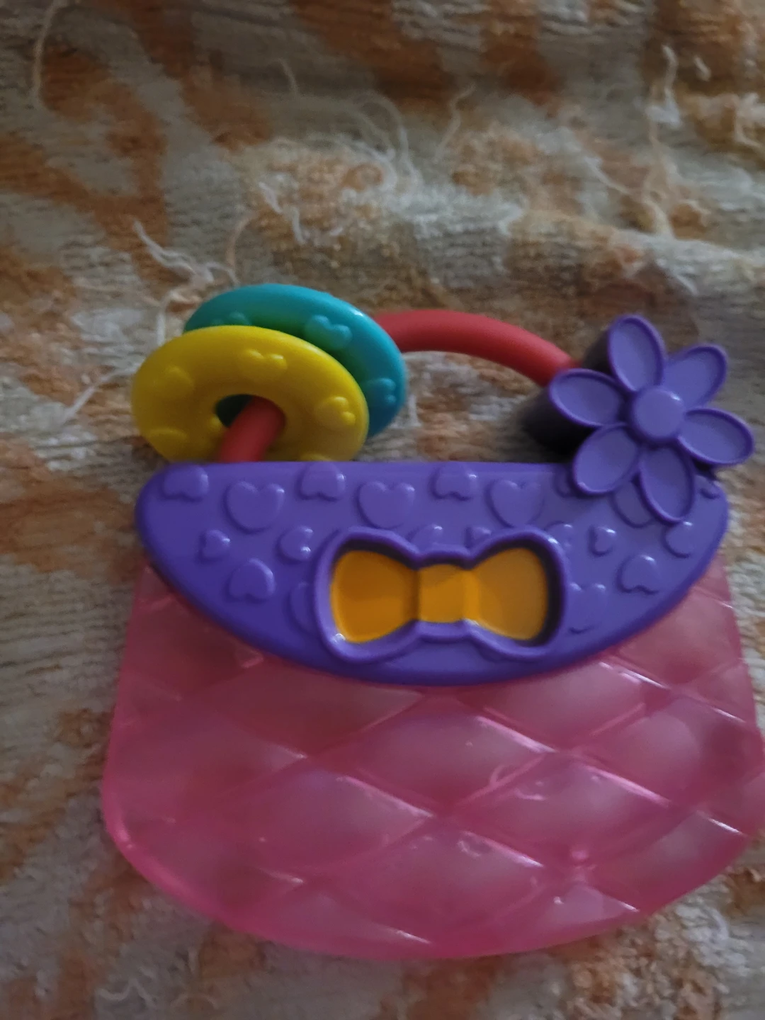 Bright Starts Carry & Teethe Purse teether toy.