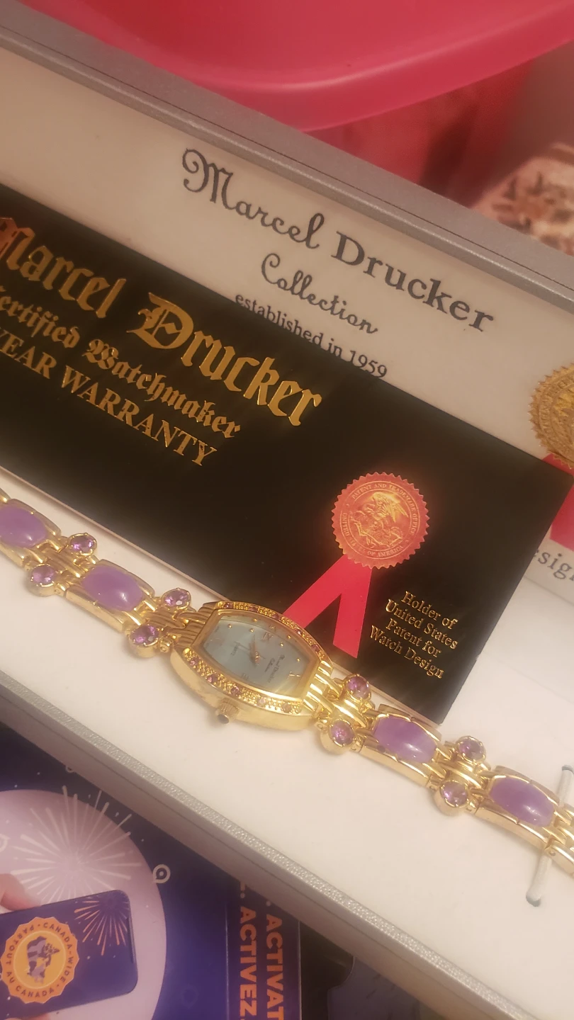 Marcel Drucker Collection Gold Tone Watch with Purple Accents