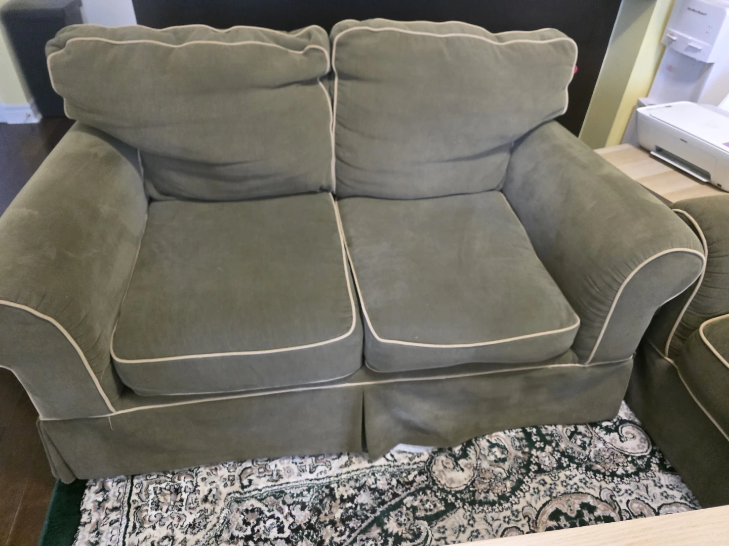 Green loveseat sofa