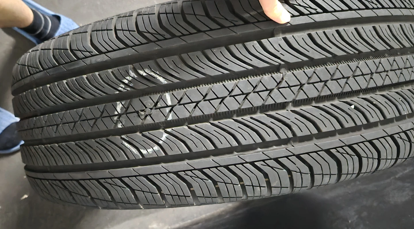 Repaired Continental ProContact TX Tire 235/55 R18