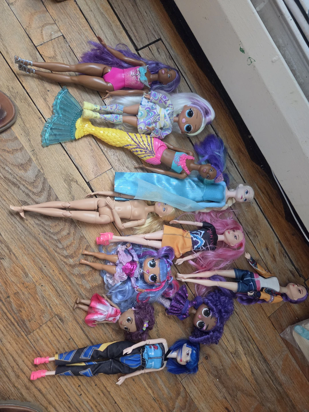 Lot of 9 Fashion Dolls