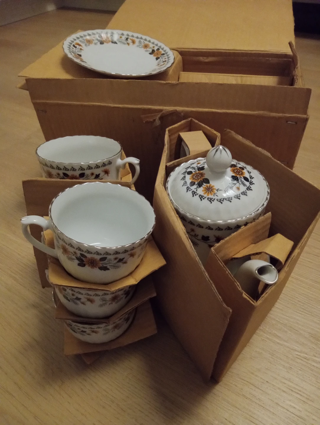 Branch new vintage porcelain tea set $30.