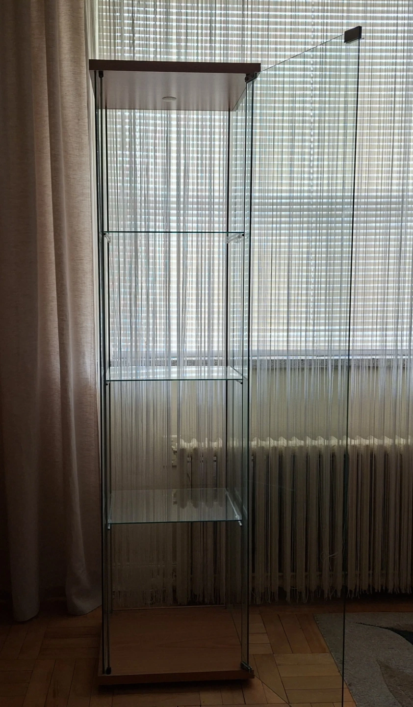 Glass display cabinet with wood top and bottom
