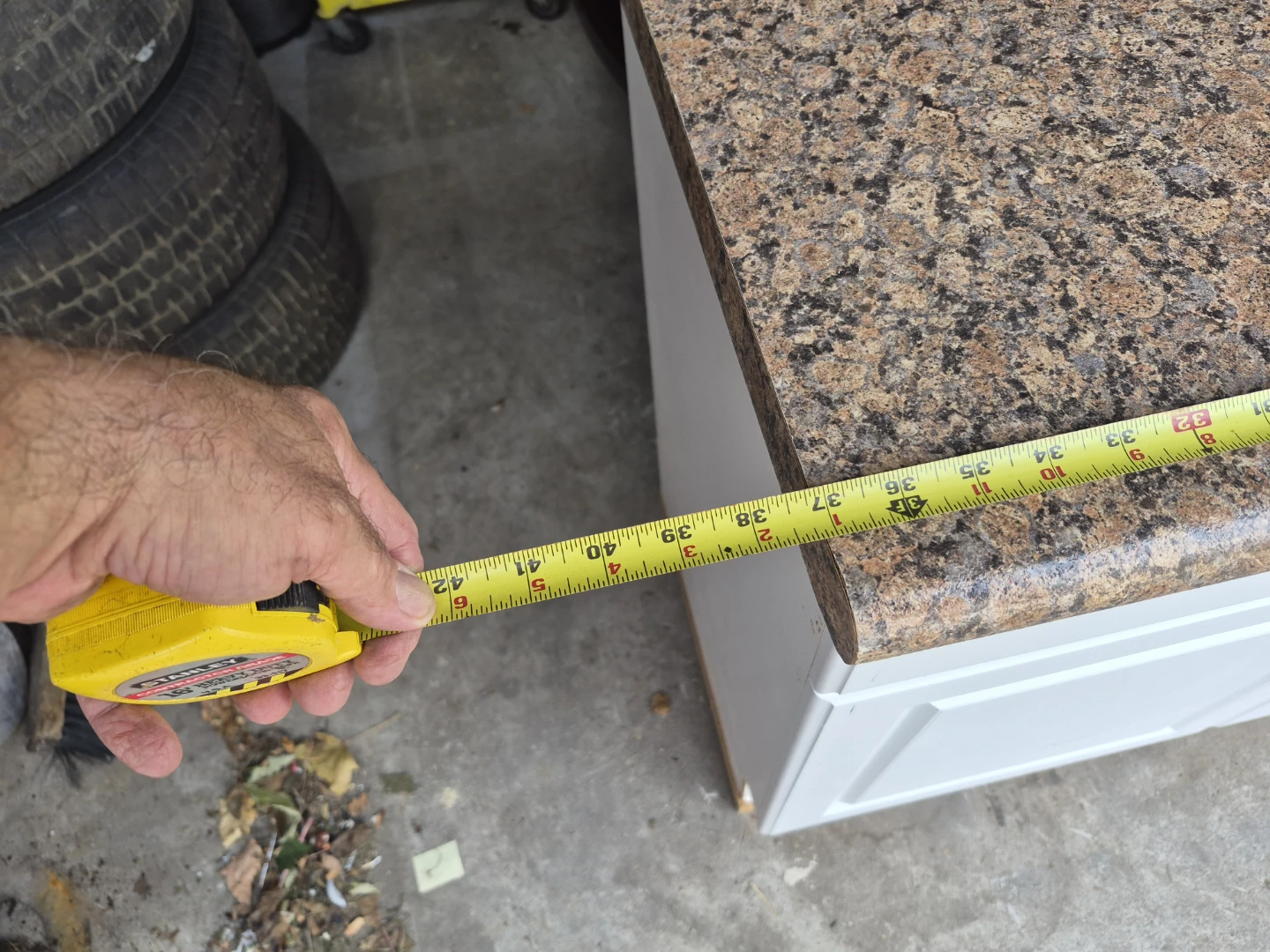 White cabinet with granite-look countertop - photo 3