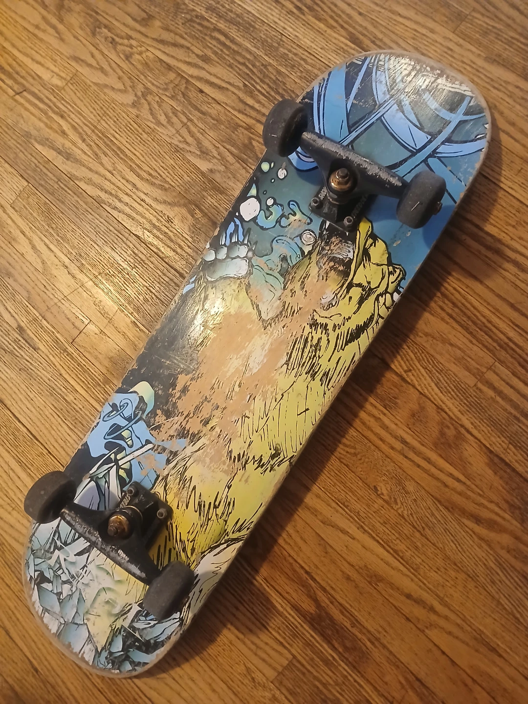 Skateboard with graphic deck