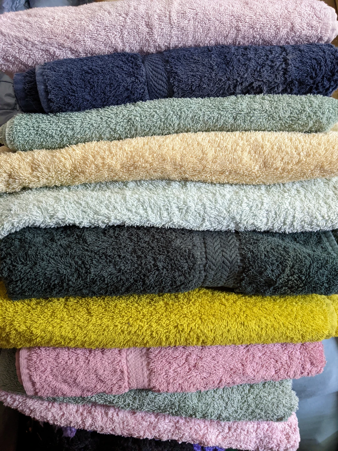 Stack of ten Colourful Bath Towels