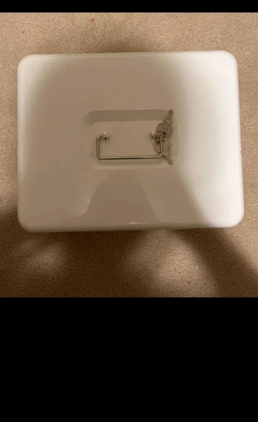 White lock box with keys