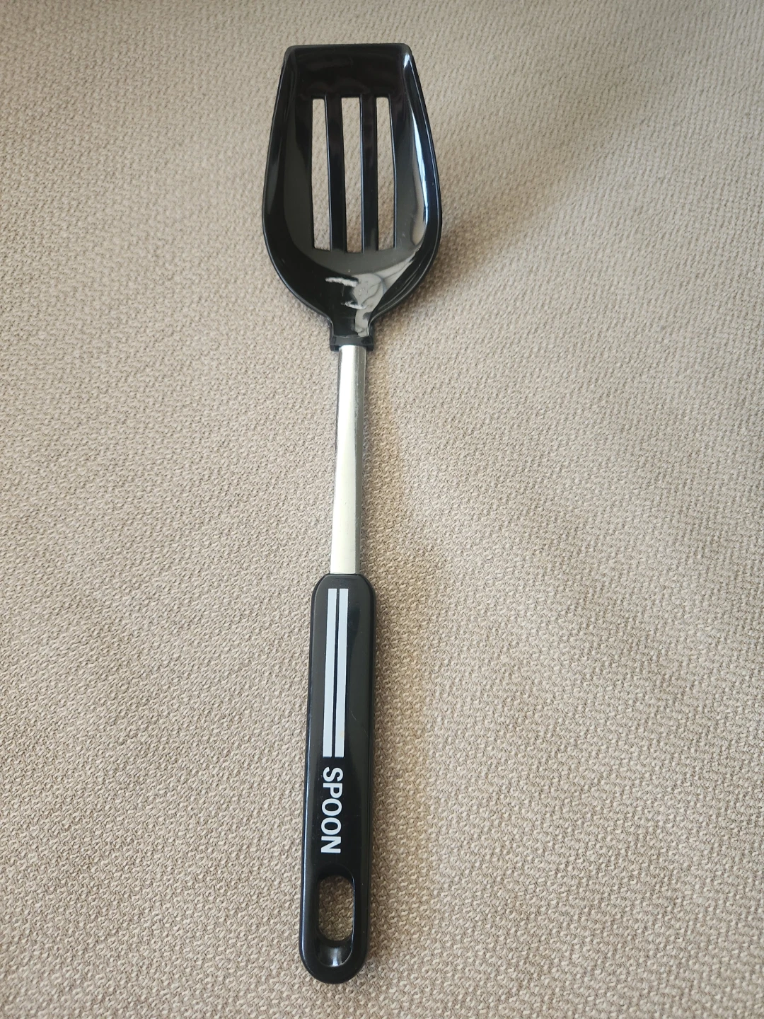 Black Slotted Kitchen Spoon with Metal Handle