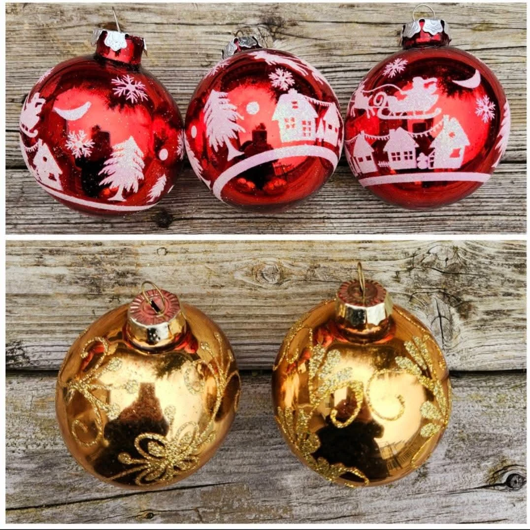 Painted decorative red & gold holiday ornaments.