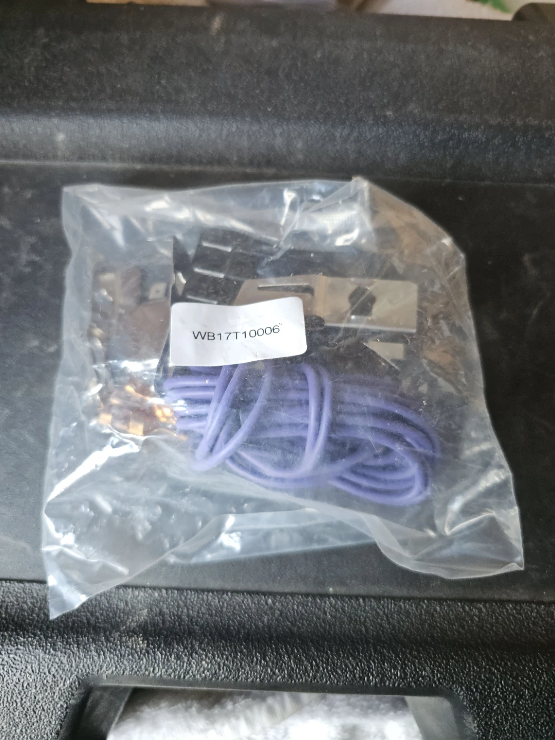 The GE WB17T10006 burner receptacle kit