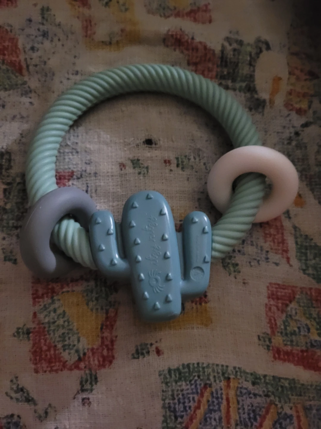 Itzy Ritzy Silicone Teether Rattle in a cactus design.