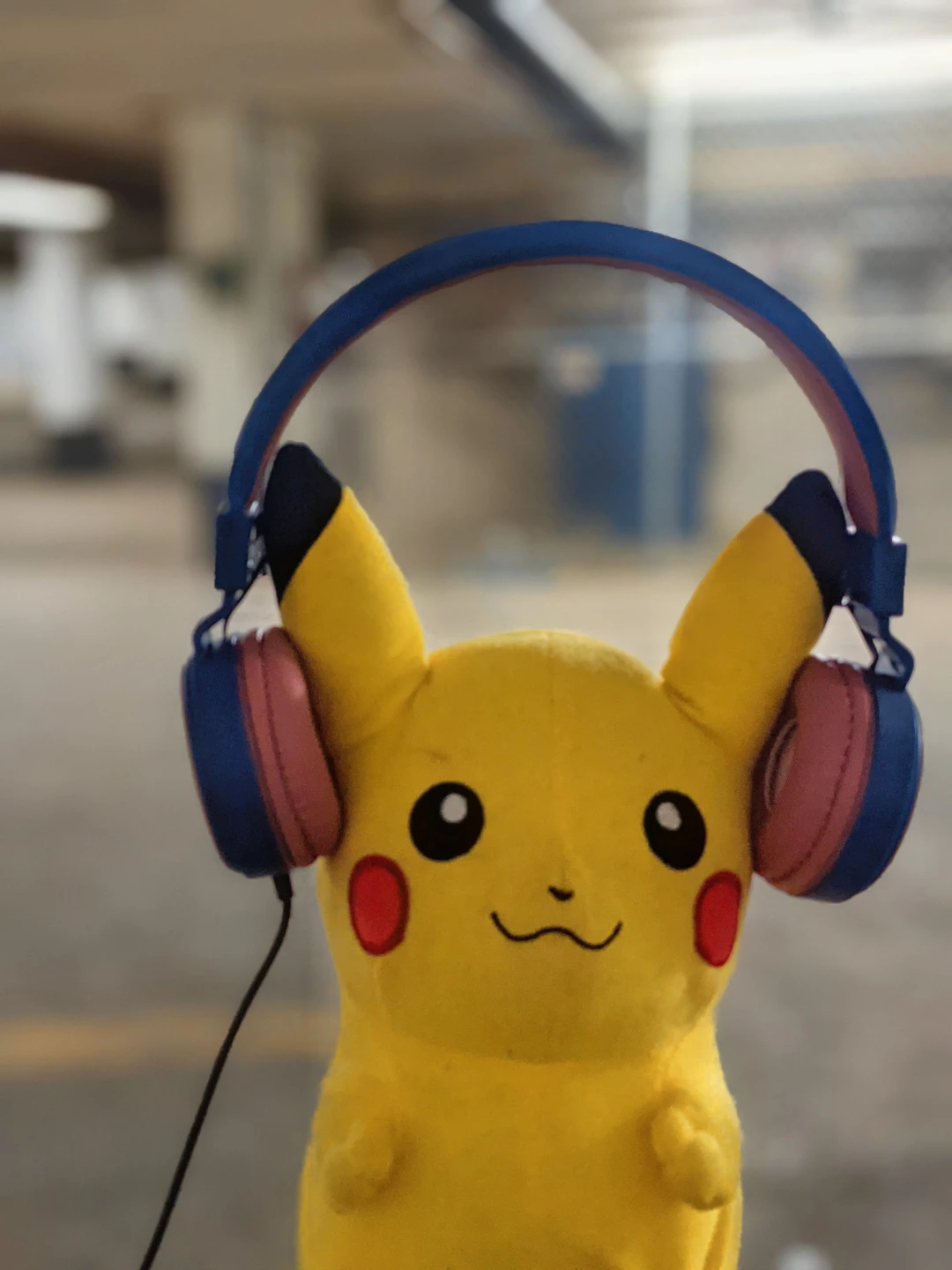 Pikachu plush with headphones