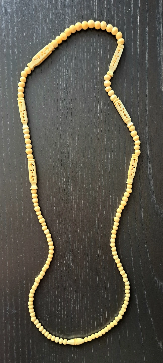 Beaded Bone Necklace with Carved Details