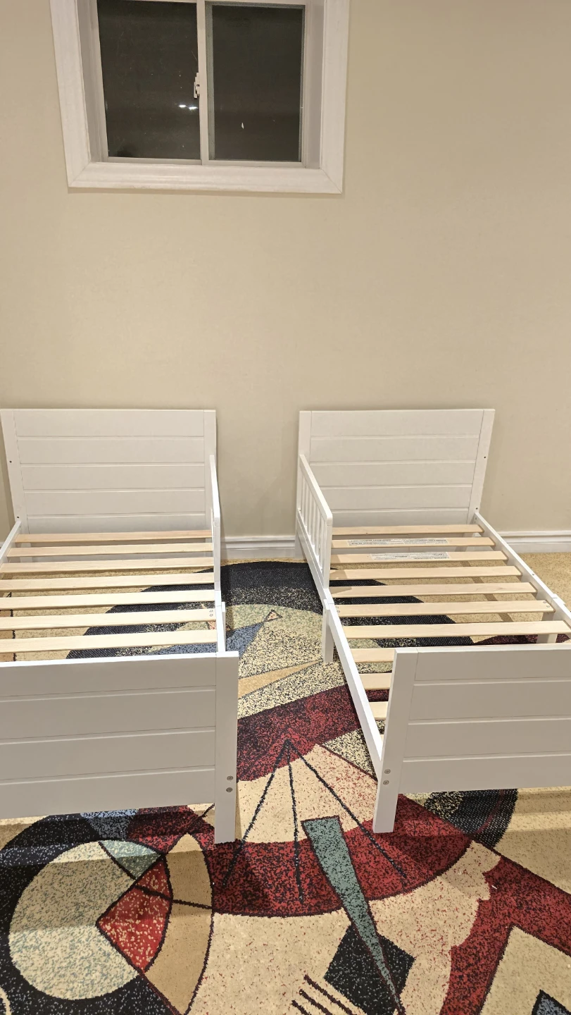 Two White Twin Beds with Rails