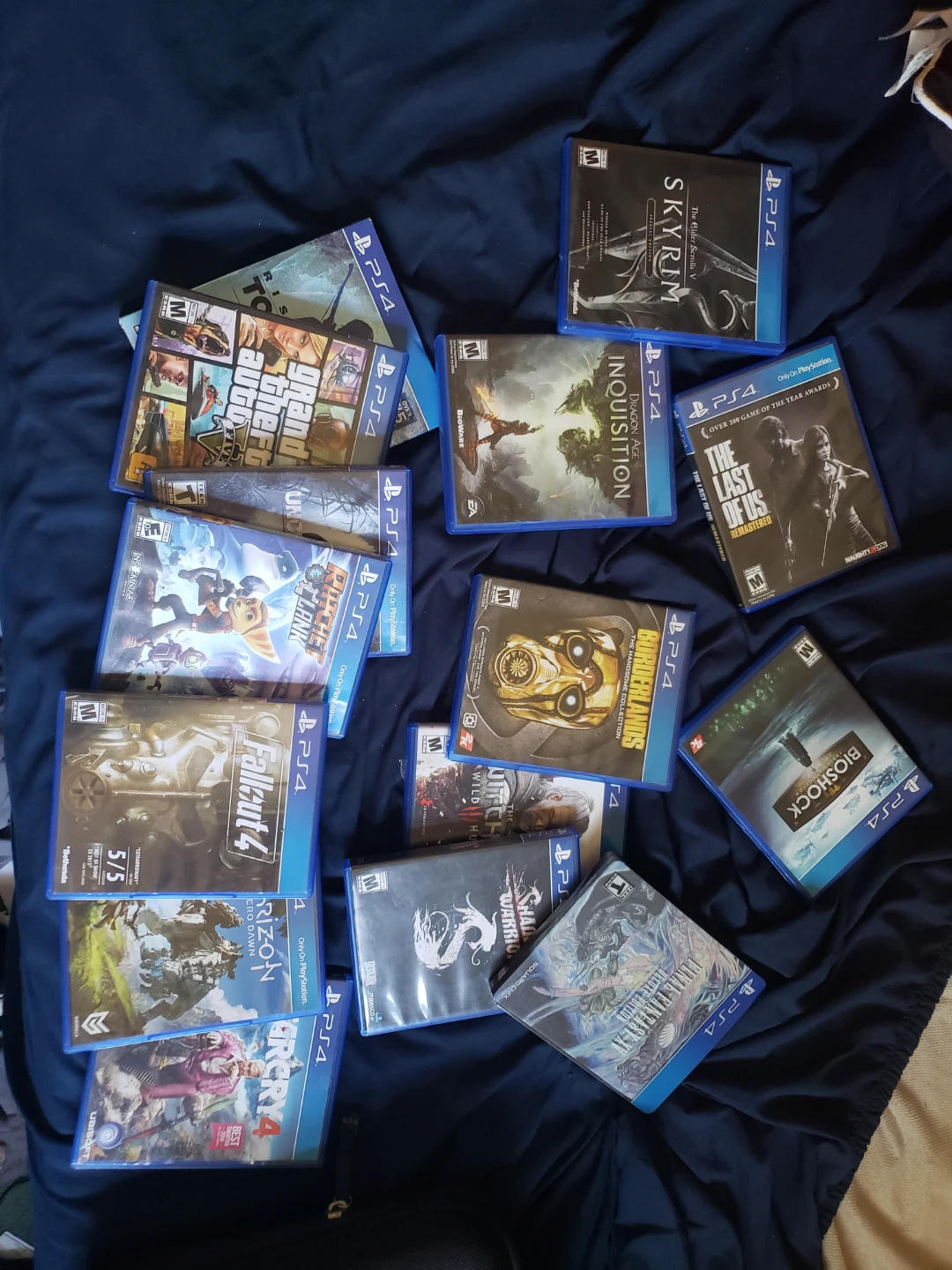 PS4 Video Game Bundle - Skyrim, The Last of Us, Fallout 4 & More