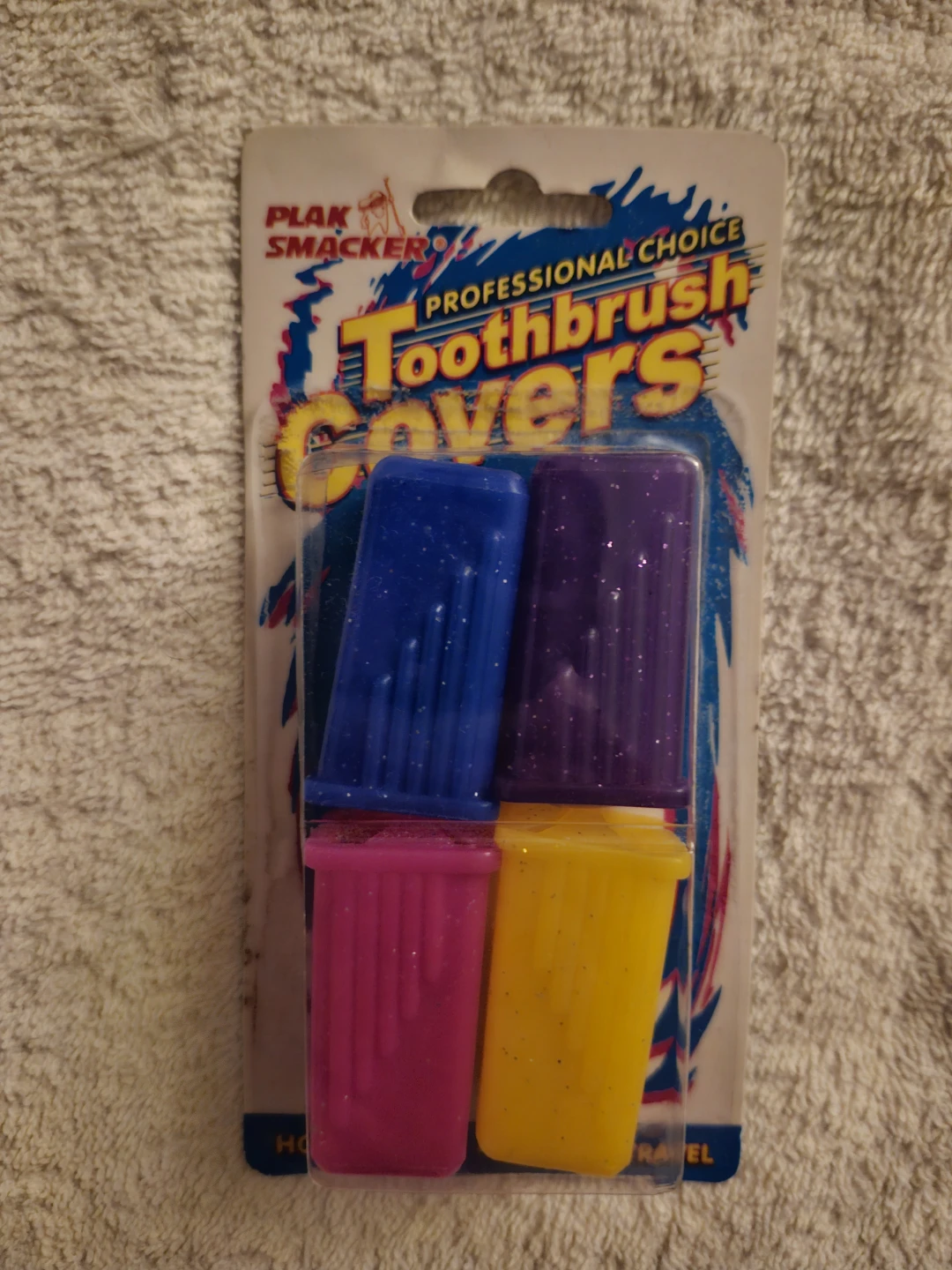 New in pk, 4 toothbrush covers holders, blue red yellow purp