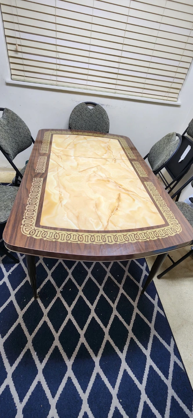 Dining Table with Marble-Look Top it's adjustable