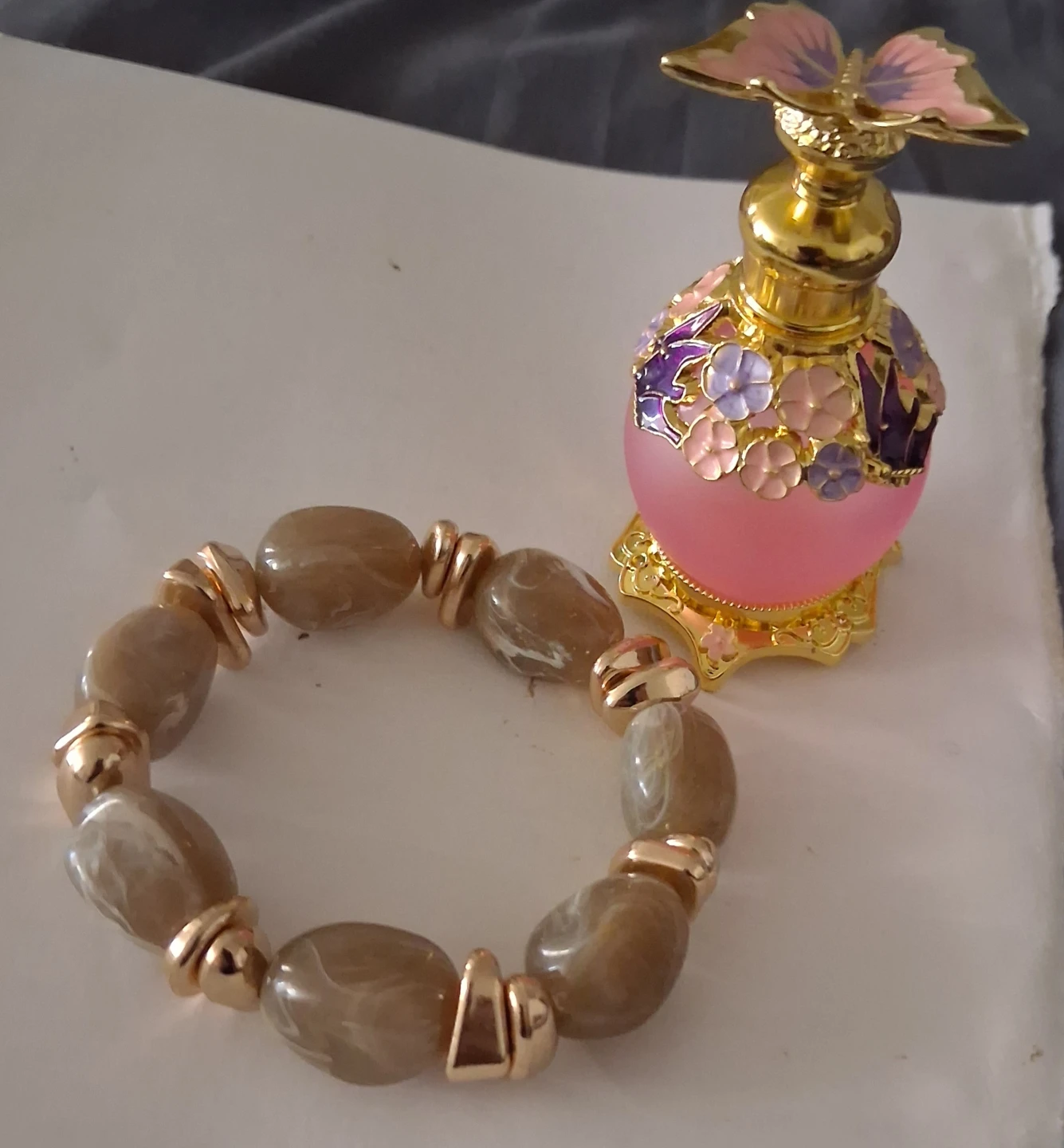 Pink Perfume Bottle with Butterfly