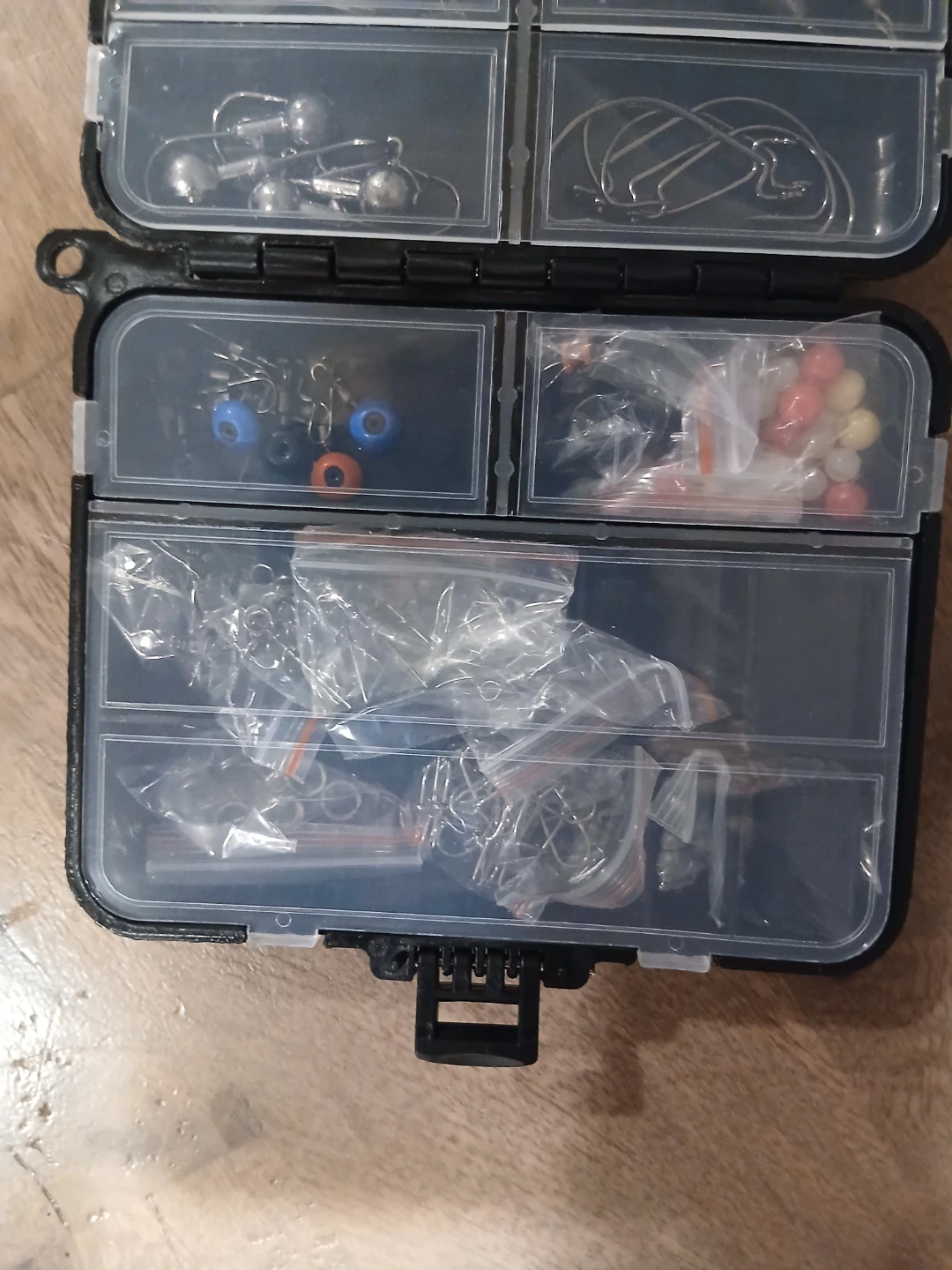 Fishing tackle box with assorted accessories - photo 3