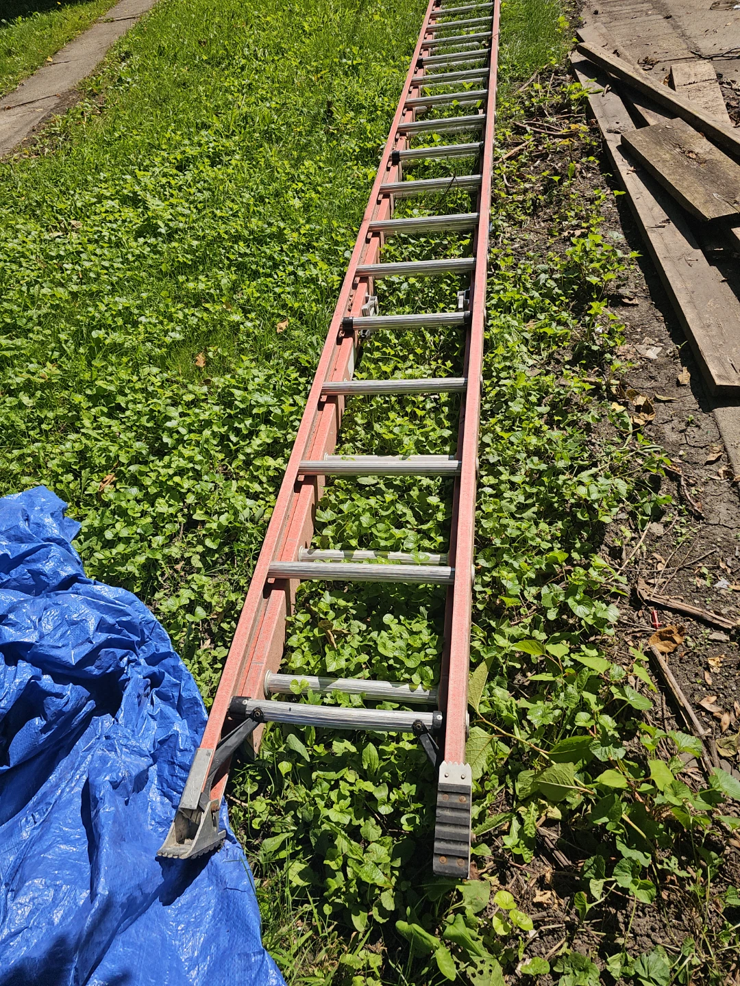 Orange fiberglass extension ladder - photo 2