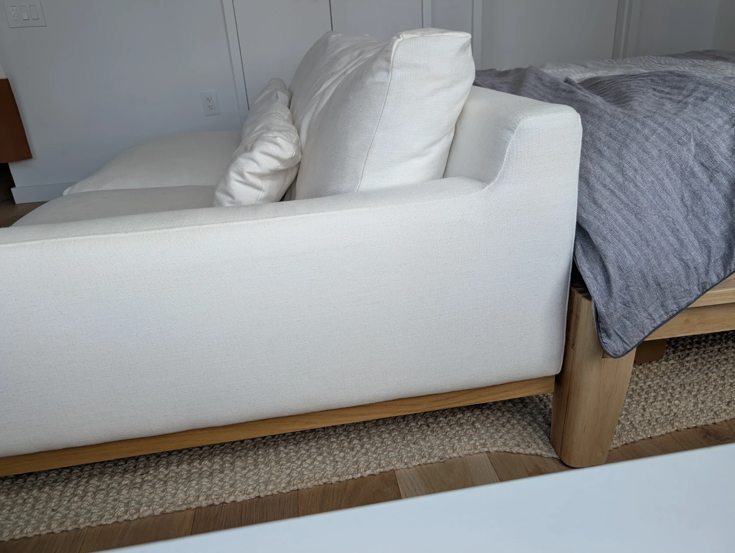 White Fabric Sofa with Wood Base