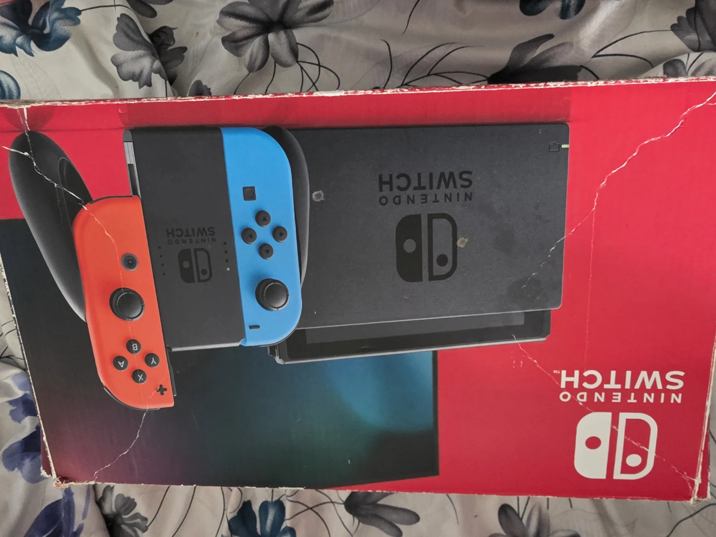 Nintendo Switch Console with Neon Red and Blue Joy-Cons