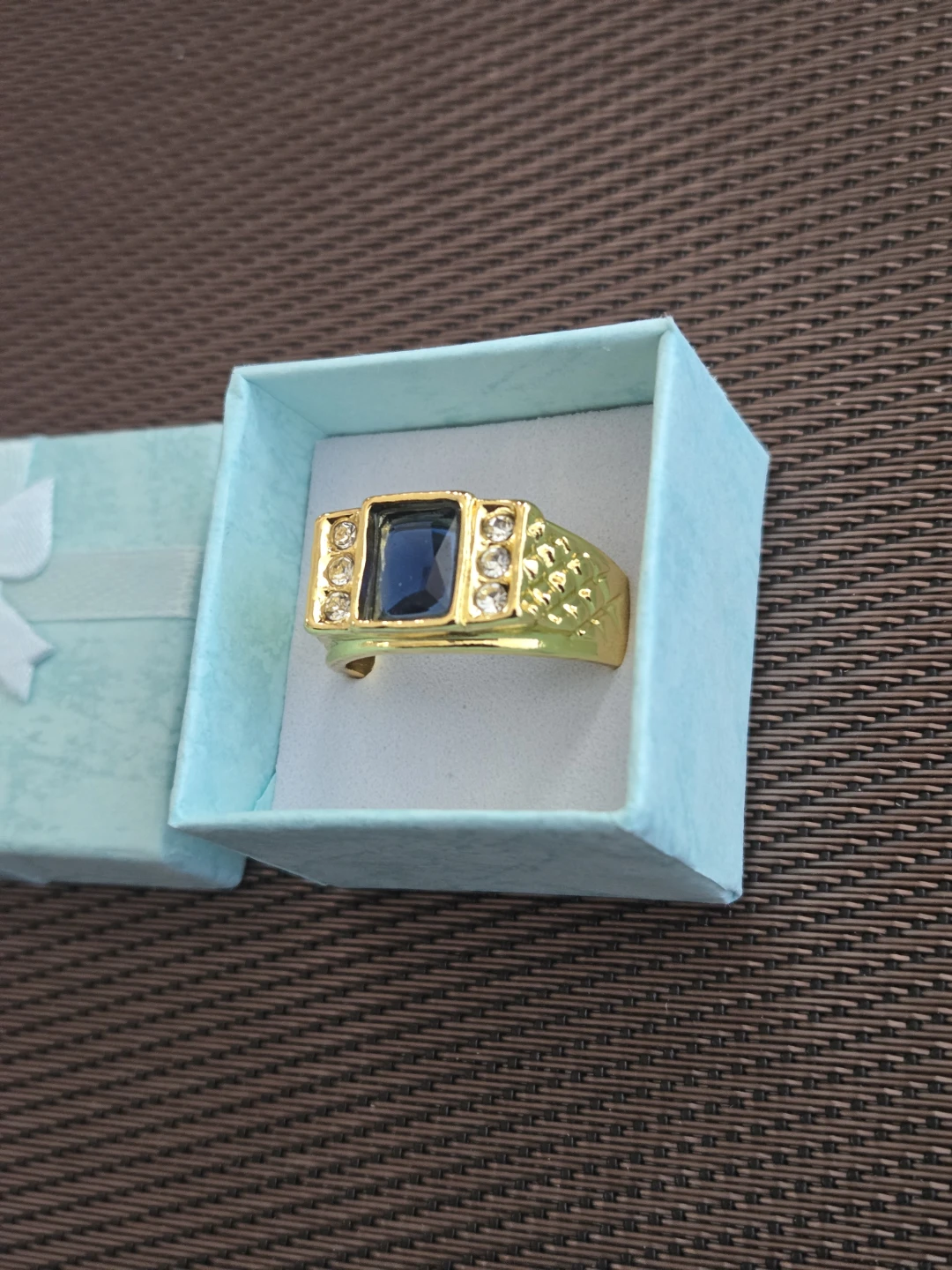 Gold Tone Ring with Blue Stone Accent