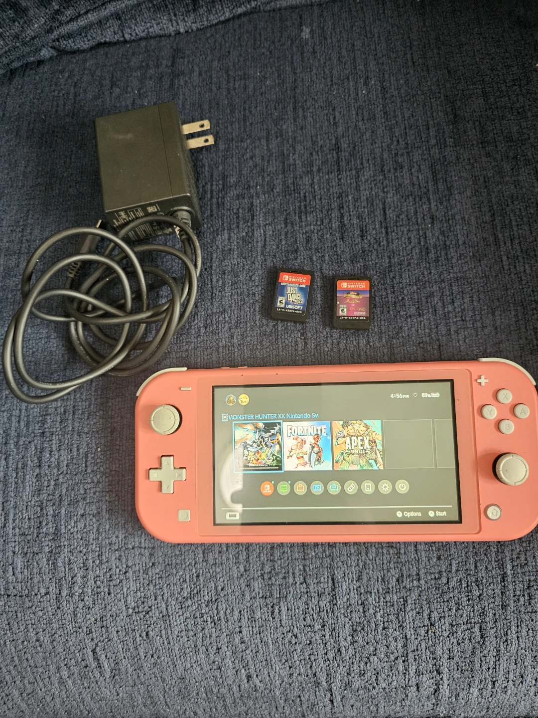 Coral Nintendo Switch Lite with 2 Games & Charger