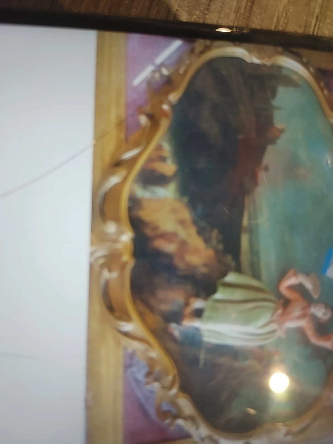 Ornate Gold Mirror with Baroque Scene