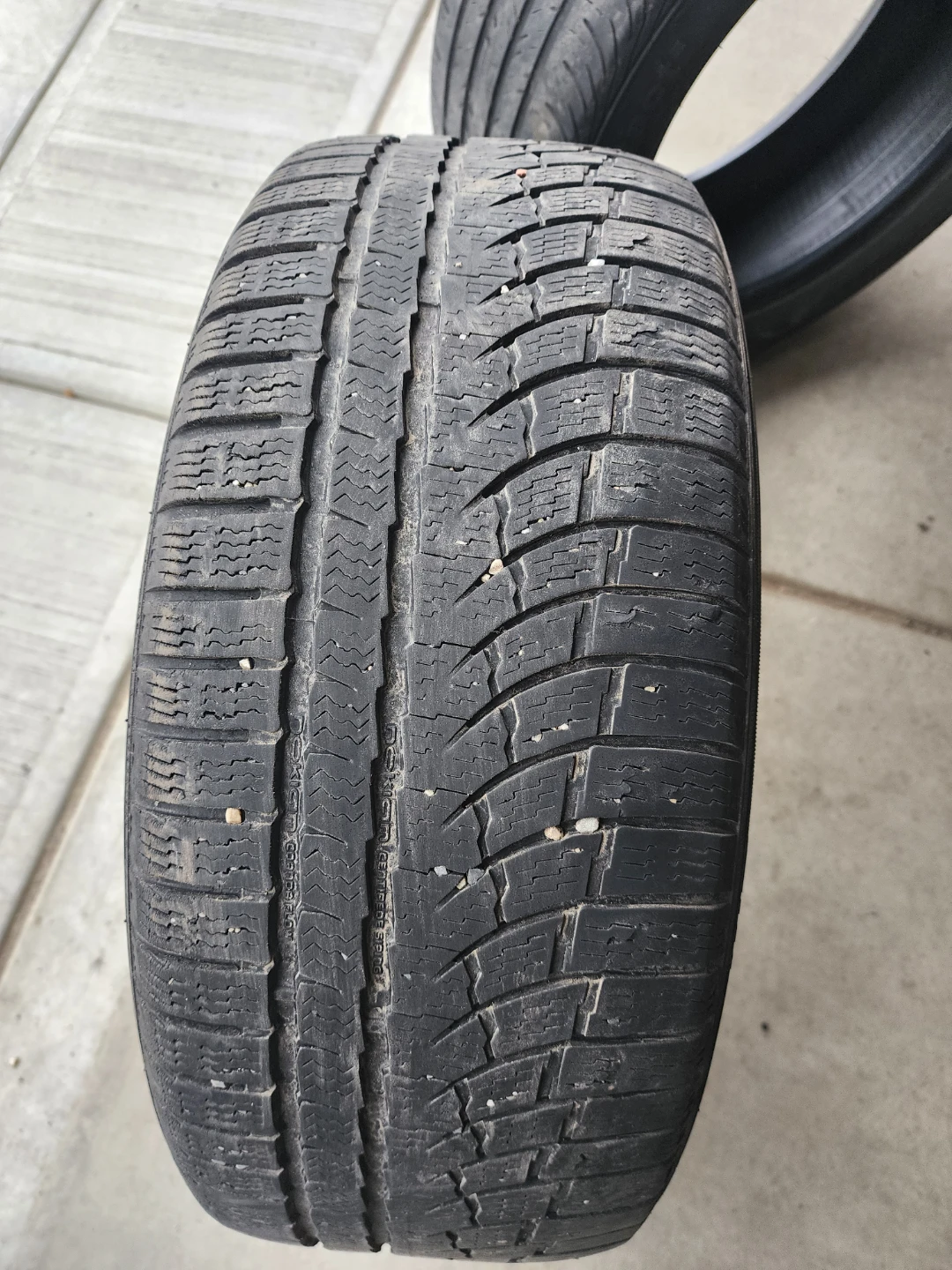 1 Used Winter Tire and 1 Used all season Tire